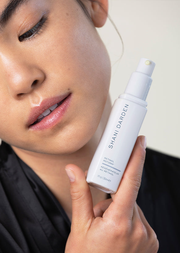 Model Holding Retinol Reform