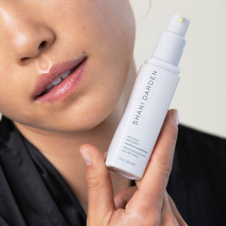 Model Holding Retinol Reform
