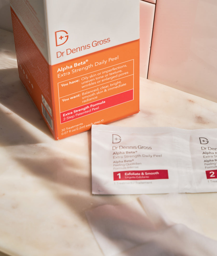 dr. dennis gross alpha beta peel pads extra strength next to box