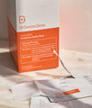 dr. dennis gross alpha beta peel pads original next to box