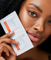 dr. dennis gross alpha beta peel pads with model
