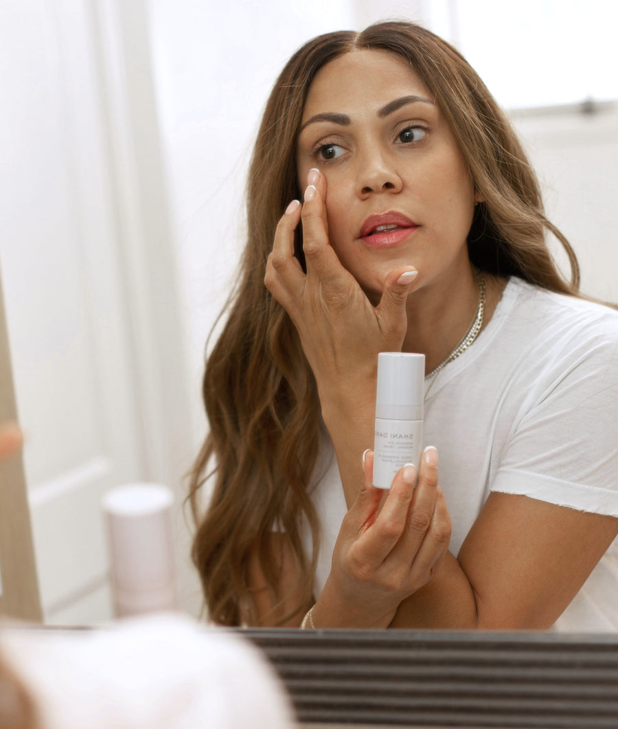 shani darden applying intensive eye renewal cream