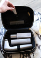 interior view of the shani darden travel case holding the facial sculpting wand and shani darden skincare products