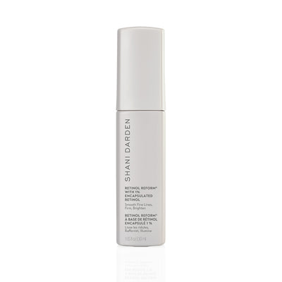 Shani Darden Retinol Reform with 1 % encapsulated retinol serum in a 30 mL matte-grey pump bottle, with a white background and front of packaging facing forward
